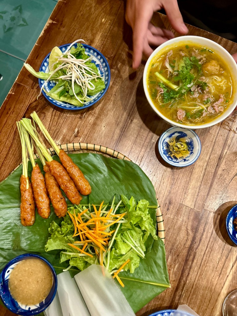 bun bo hue soup and pork skewers in hue vietnam